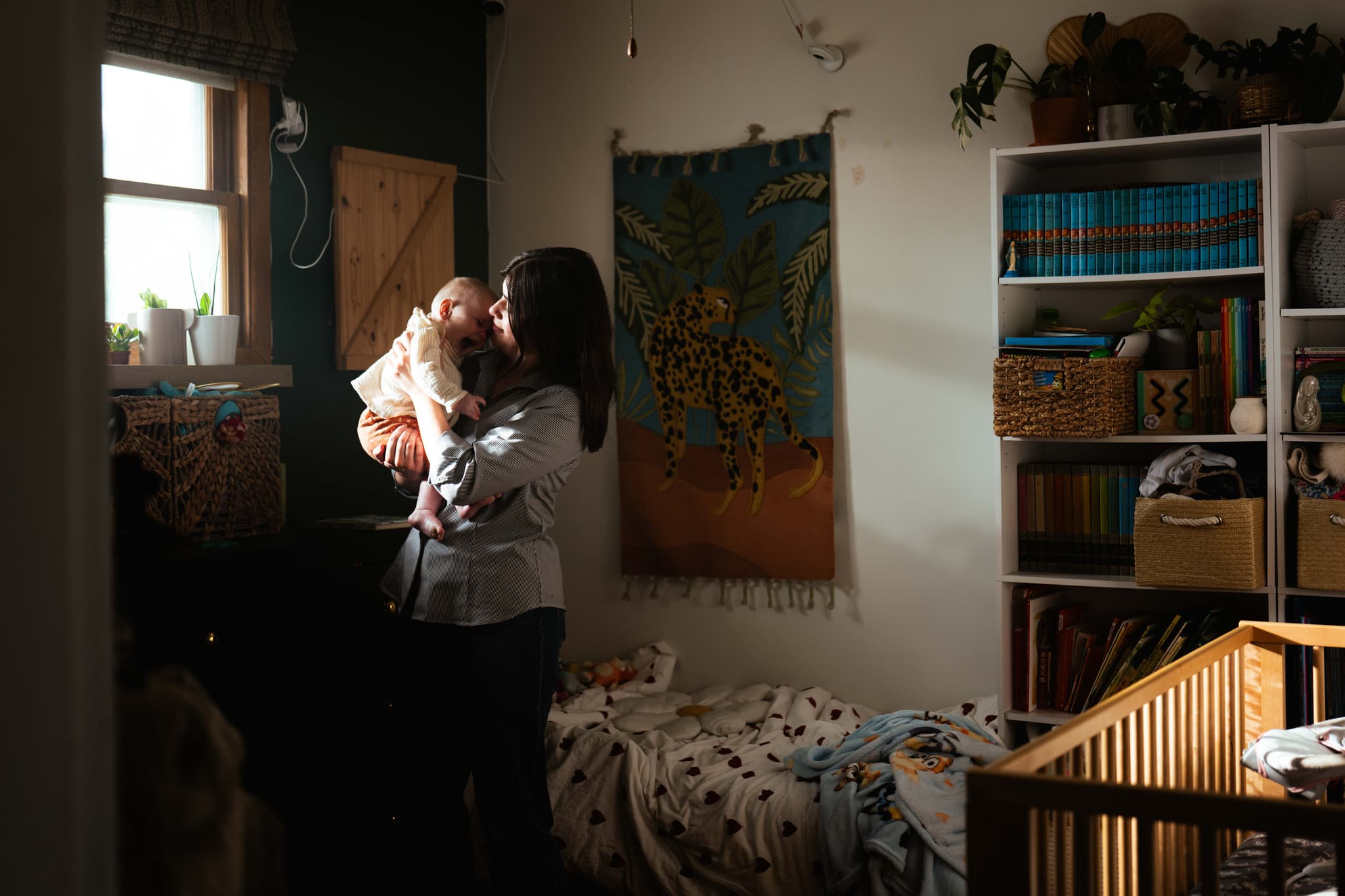 A tender, quiet moment between a mother and child at home