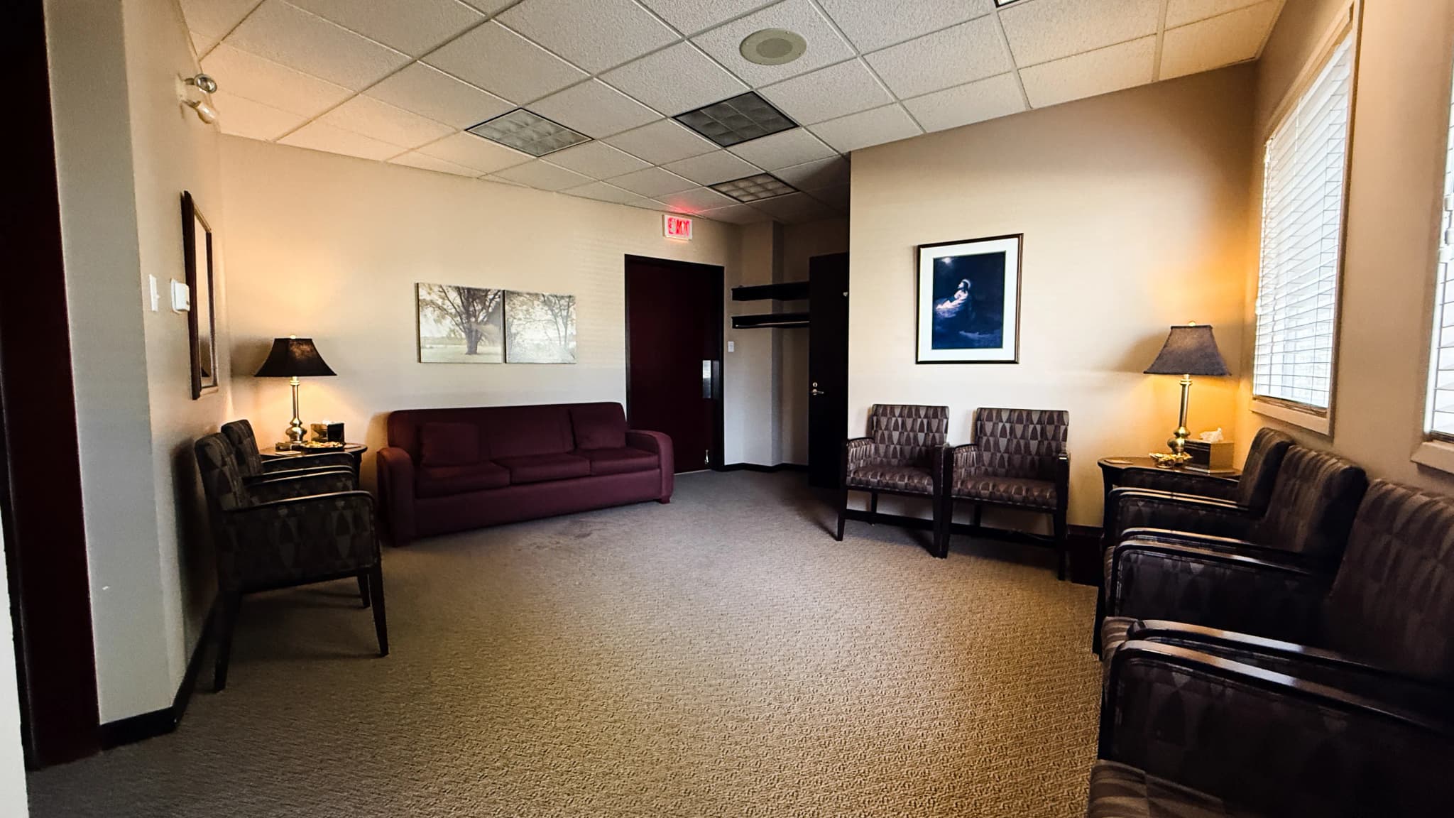 Comfortable seating and refreshment area in our private visitation suites.